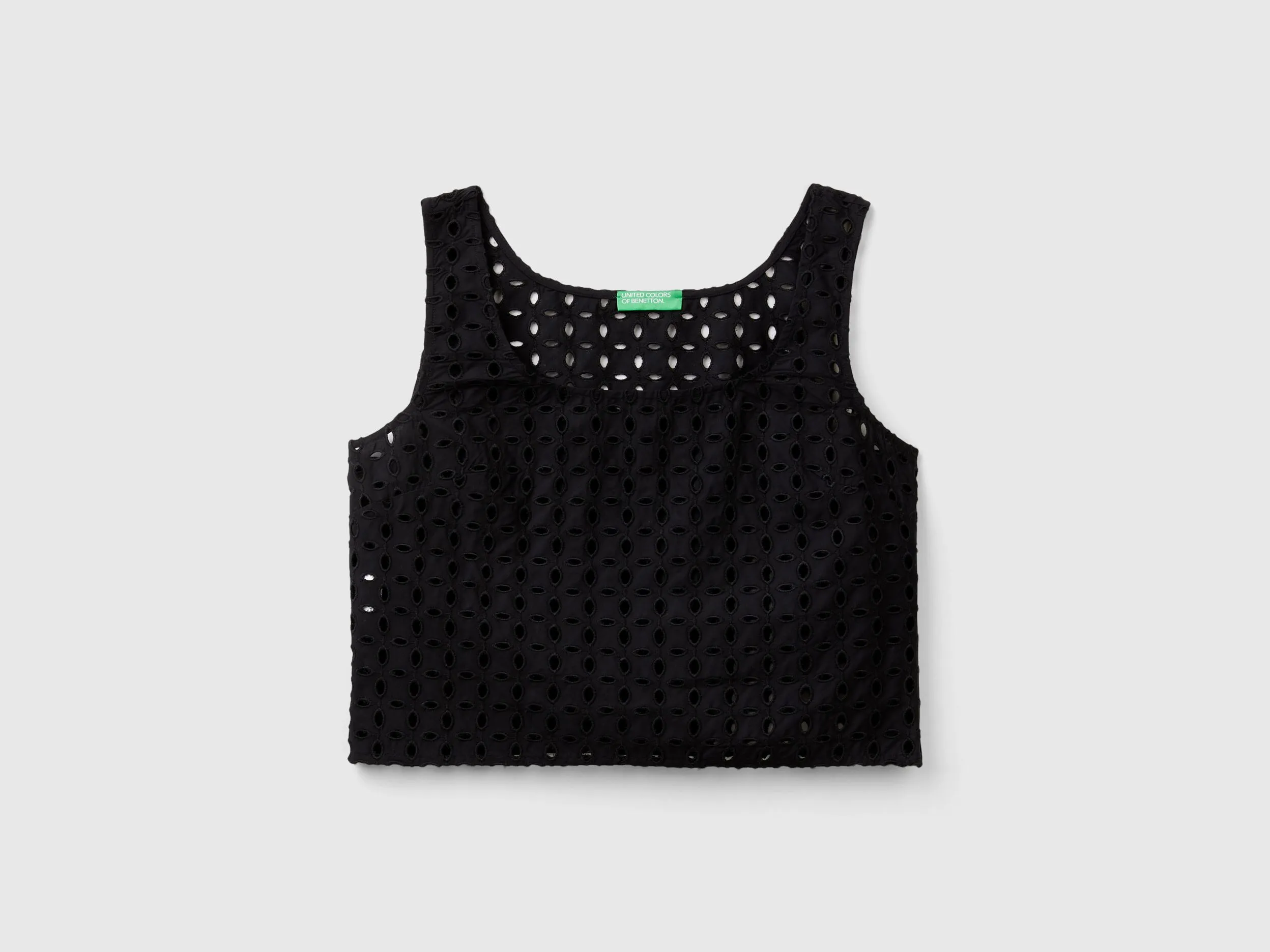 Blusa de encaje suizo sin mangas