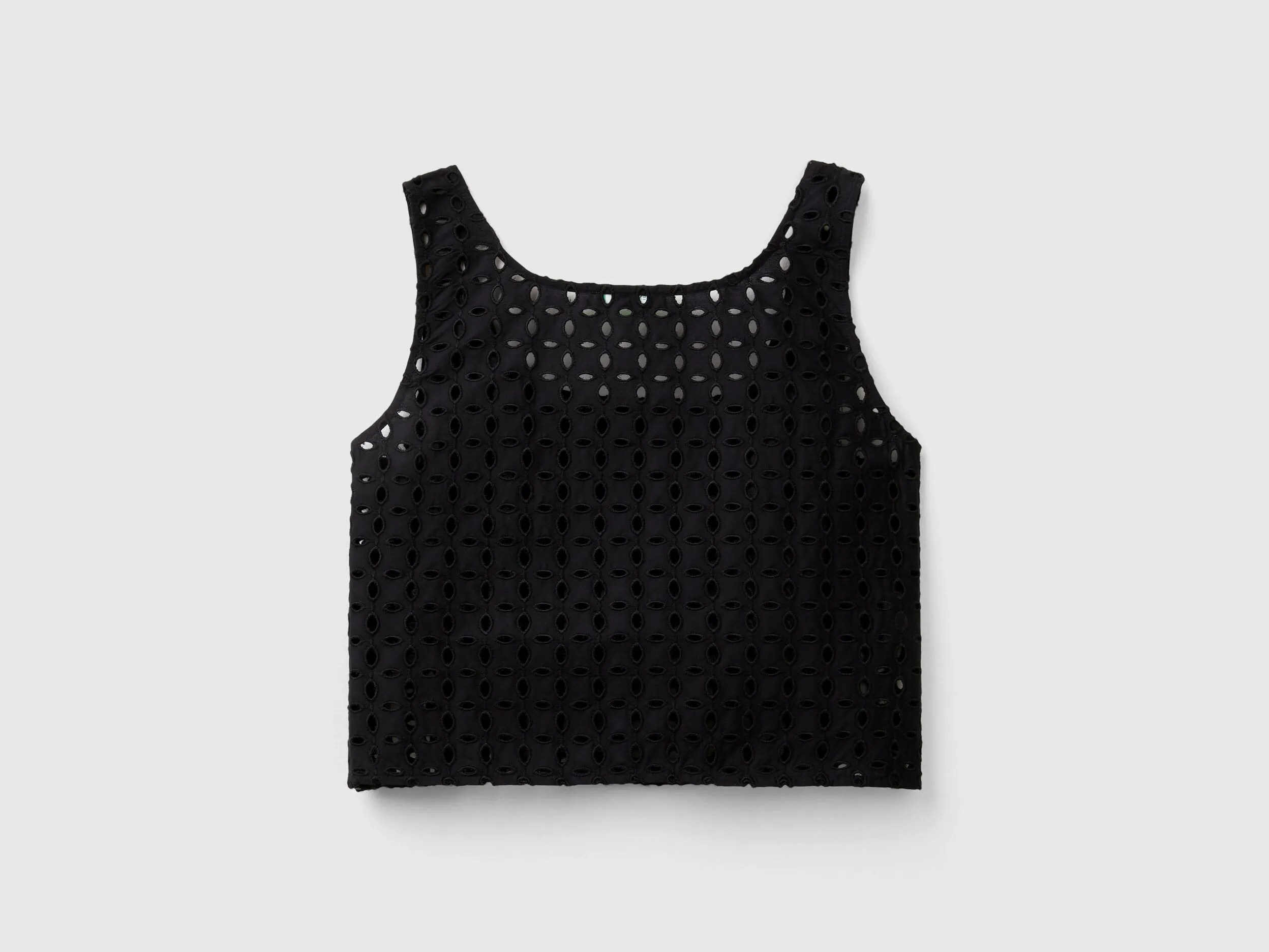 Blusa de encaje suizo sin mangas