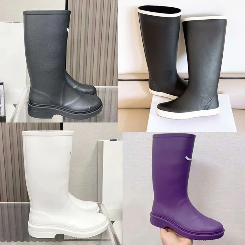 Botas de lluvia para mujer Botas de lluvia de goma de diseñador Bota hasta la rodilla de PVC 23FW Estilo casual Botas Welly impe