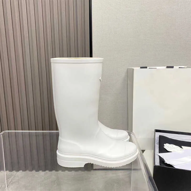 Botas de lluvia para mujer Botas de lluvia de goma de diseñador Bota hasta la rodilla de PVC 23FW Estilo casual Botas Welly impe