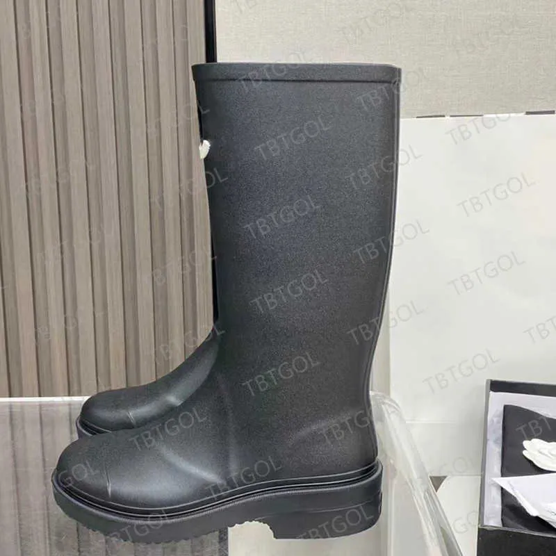 Botas de lluvia para mujer Botas de lluvia de goma de diseñador Bota hasta la rodilla de PVC 23FW Estilo casual Botas Welly impe