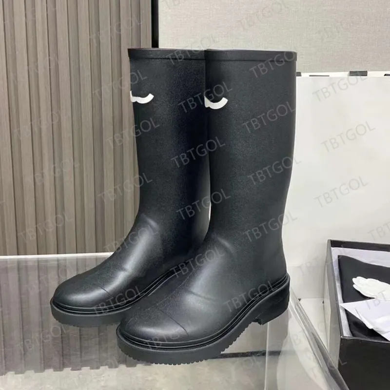 Botas de lluvia para mujer Botas de lluvia de goma de diseñador Bota hasta la rodilla de PVC 23FW Estilo casual Botas Welly impe