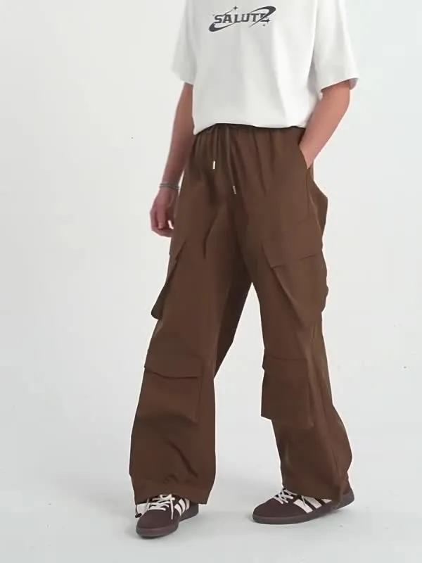Pantalones cargo holgados lisos con múltiples bolsillos para hombre
