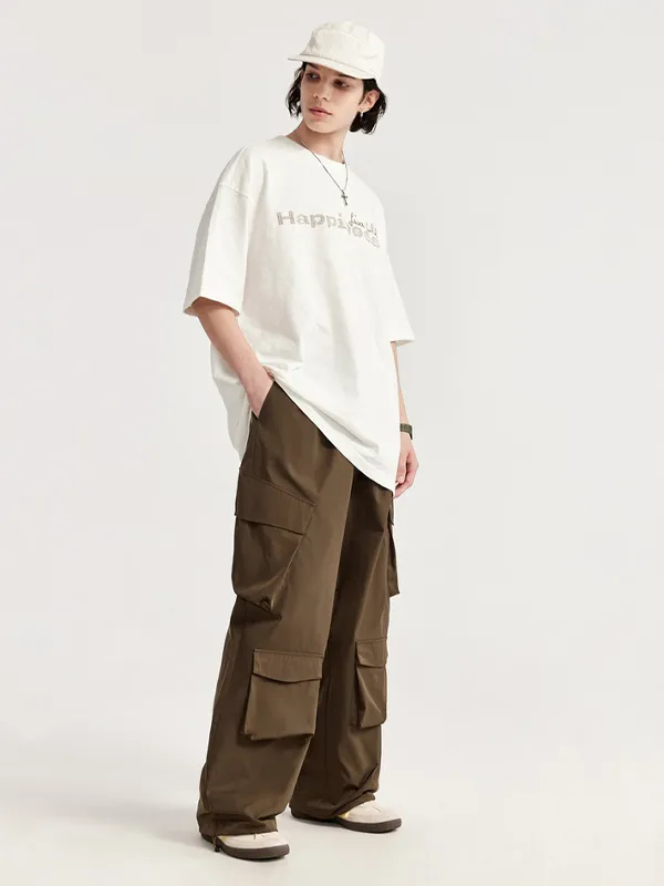 Pantalones cargo holgados lisos con múltiples bolsillos para hombre