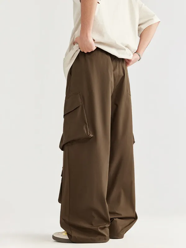Pantalones cargo holgados lisos con múltiples bolsillos para hombre
