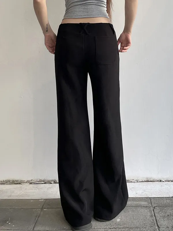Pantalones holgados a medida de color liso