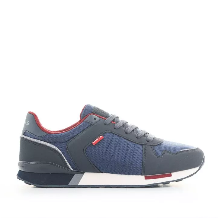 Zapatillas deportivas Levi's azules con suela blanca y detalles rojos